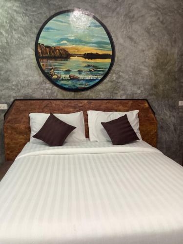 Postel nebo postele na pokoji v ubytování Baan Saitharn Koh Lanta