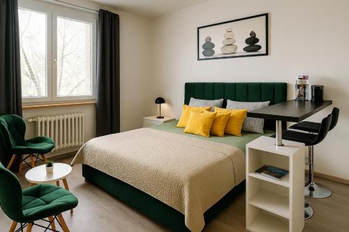 Ένα ή περισσότερα κρεβάτια σε δωμάτιο στο Výchozí bod pro saské Švýcarsko, pet friendly, Děčínský moderní apartmán