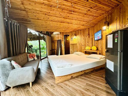 Postel nebo postele na pokoji v ubytování KITE HOUSE - Căn nhà cánh diều