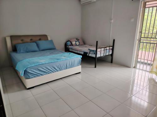 Postel nebo postele na pokoji v ubytování Happy Home