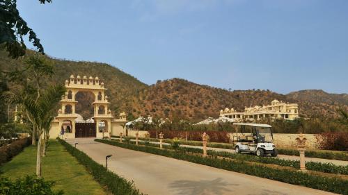 a truck is parked in front of a building at Rajasthali Resort & Spa in Jaipur