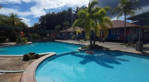 Bazén v ubytování Global Ikhwan Resort nebo v jeho okolí