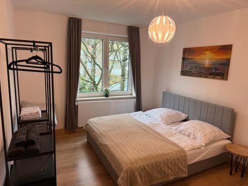 Postel nebo postele na pokoji v ubytování Home im Pott - Sehr Zentral - 4 Pers, TV