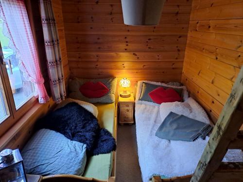 Кровать или кровати в номере Chalet Chnorz Rooms