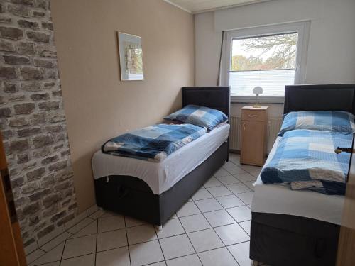 Postel nebo postele na pokoji v ubytování Ferienwohnung Beate & Burkhard