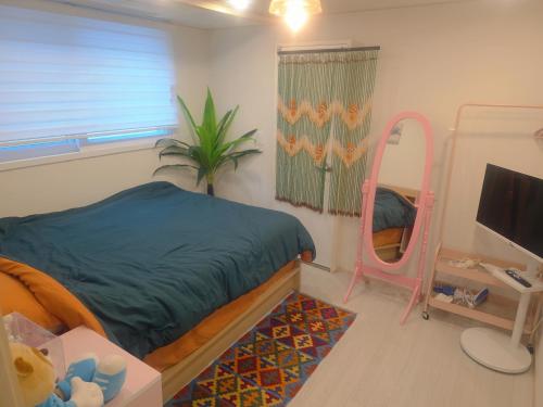 Μια τηλεόραση ή/και κέντρο ψυχαγωγίας στο 홍대 풀하우스!신축!무료주차!엘베 남들과다른 특별한공간