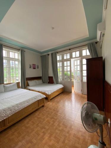 Postel nebo postele na pokoji v ubytování HOMESTAY 172A Ho Quy Ly BAI SAU