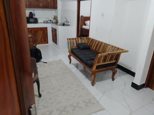 Η κουζίνα ή μικρή κουζίνα στο Kahawa apartment