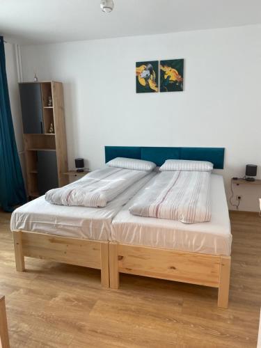 Postel nebo postele na pokoji v ubytování Green Studio Nord