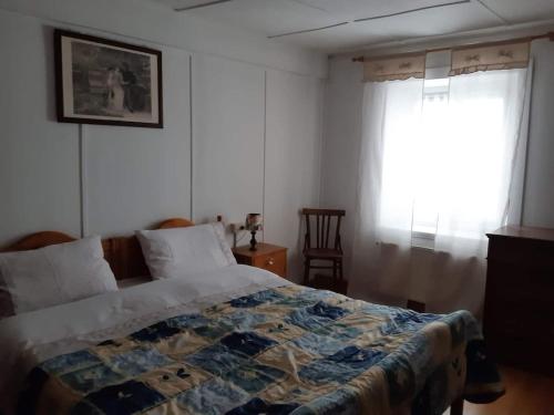 Postel nebo postele na pokoji v ubytování Lili's house