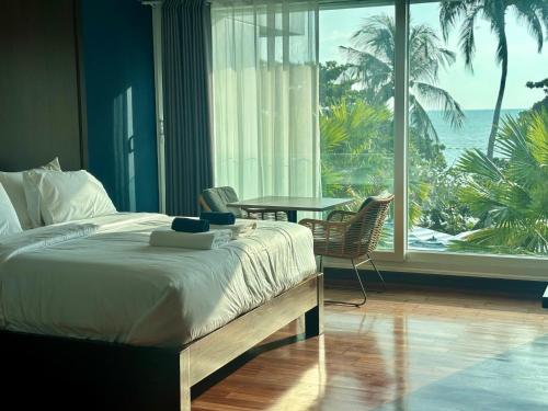 Postel nebo postele na pokoji v ubytování Gooseberry Baan & Bistro