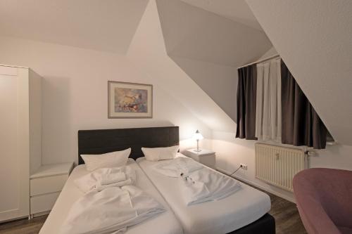 Ένα ή περισσότερα κρεβάτια σε δωμάτιο στο Hotel Scheffelhof