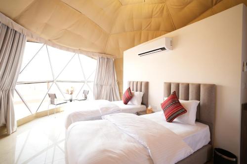 Llit o llits en una habitació de Terra Nova Camp
