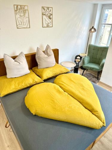 Ένα ή περισσότερα κρεβάτια σε δωμάτιο στο Ferienwohnung Golden Hour mit Seeblick