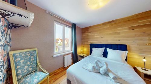 Postel nebo postele na pokoji v ubytování Gîte du Musée