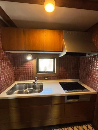 Cucina o angolo cottura di Setouchi Retreats Sera Highlands