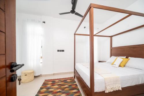 Ένα ή περισσότερα κρεβάτια σε δωμάτιο στο Valletta Homes