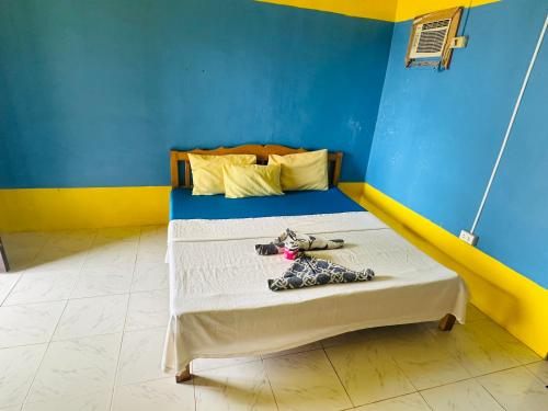 Postel nebo postele na pokoji v ubytování Sunny Shine Beach Resort