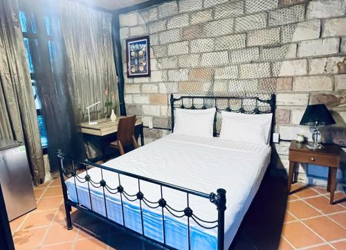 Postel nebo postele na pokoji v ubytování Lam Mountain Retreat Ông Lang