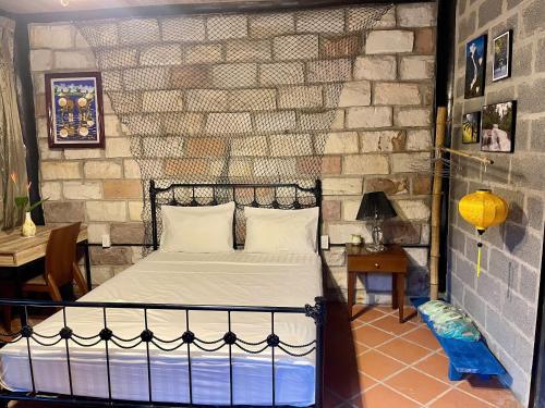 Postel nebo postele na pokoji v ubytování Lam Mountain Retreat Ông Lang