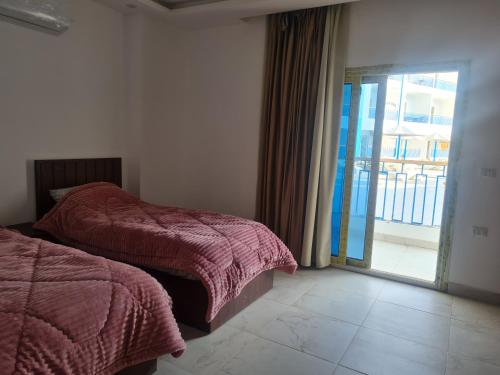 Postel nebo postele na pokoji v ubytování Mirage Bay Resort & Aqua Park