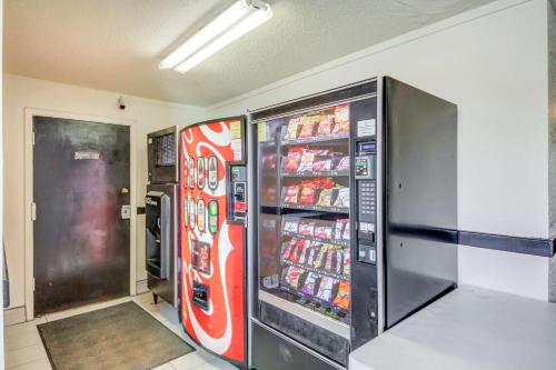 a room with two vending machines with drinks at Motel 6-Wichita, KS in Wichita