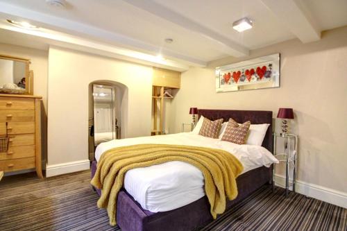 Postel nebo postele na pokoji v ubytování Chester Apartments