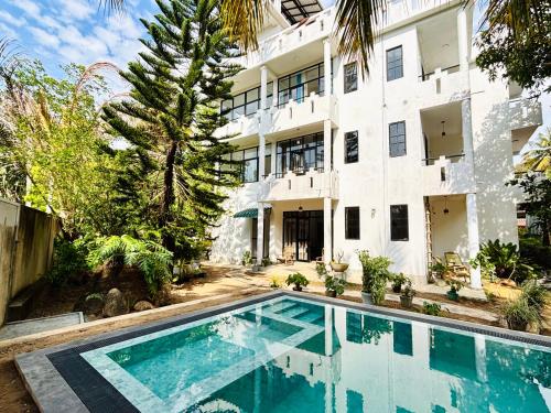 Πισίνα στο ή κοντά στο Coloration Villa Hikkaduwa