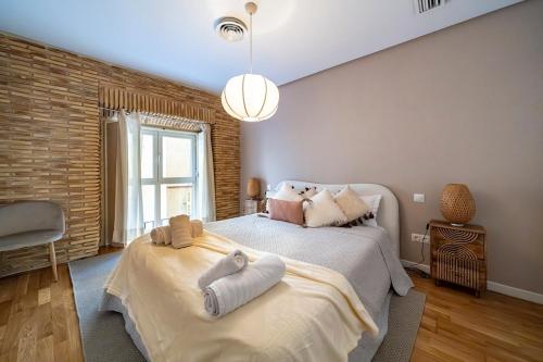 Ένα ή περισσότερα κρεβάτια σε δωμάτιο στο Impresionante Tríplex en Canaleja, Sol