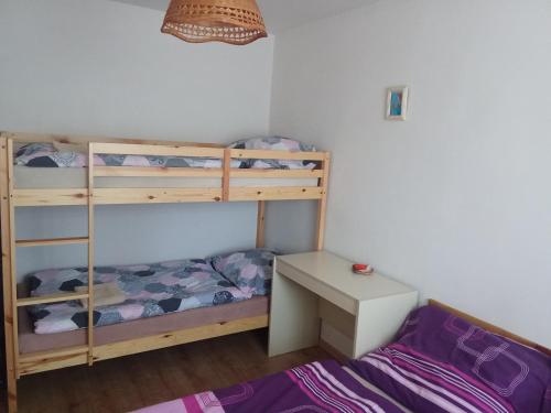 Postel nebo postele na pokoji v ubytování Bungalov Mikulášovice