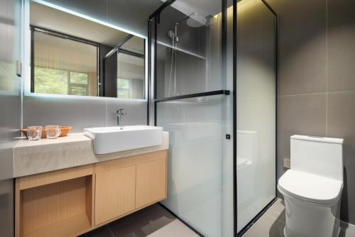 Ένα μπάνιο στο Weisi Zhenpin Holiday Courtyard