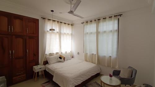 Ένα ή περισσότερα κρεβάτια σε δωμάτιο στο The Petrance Apartment