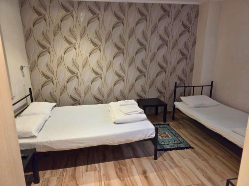 Ένα ή περισσότερα κρεβάτια σε δωμάτιο στο Byzanthin rooms