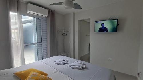 Et tv og/eller underholdning på Encantos do Mar Pousadinha