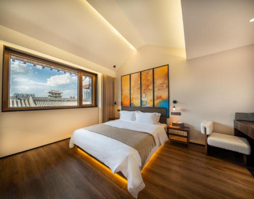 Ένα ή περισσότερα κρεβάτια σε δωμάτιο στο Nan she