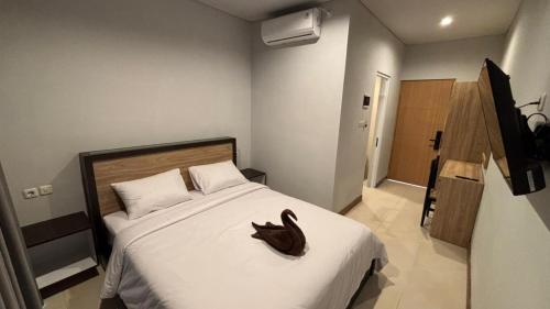 En eller flere senge i et værelse på Lushy Kintamani