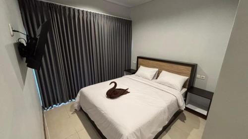 En eller flere senge i et værelse på Lushy Kintamani