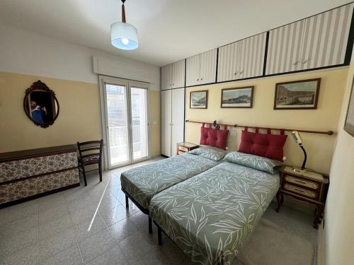 Ένα ή περισσότερα κρεβάτια σε δωμάτιο στο Appartamento Urban Daisy