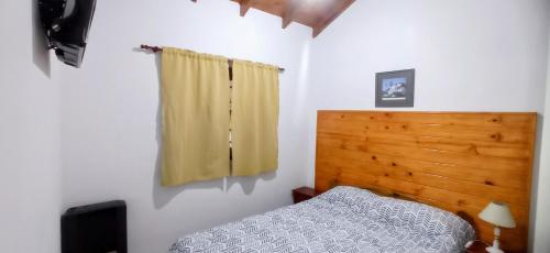 Ένα ή περισσότερα κρεβάτια σε δωμάτιο στο Dulcesdias