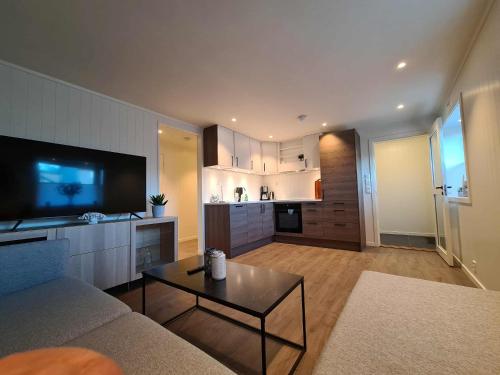 Køkken eller tekøkken på Sentral leilighet