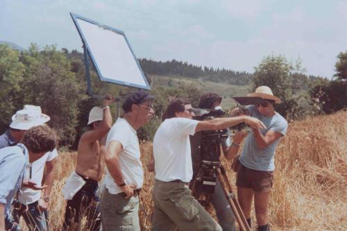 a group of people standing in a field with a camera at Fattoria Poggio Capponi in Montespertoli