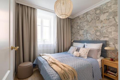 Ένα ή περισσότερα κρεβάτια σε δωμάτιο στο Red Roof Apartments Old Town