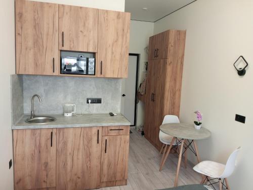 Kuchyň nebo kuchyňský kout v ubytování GrandFemeli