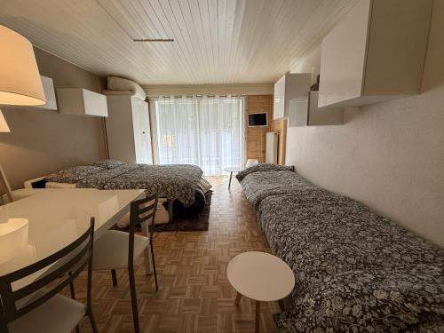 Postel nebo postele na pokoji v ubytování Studio à Morgins