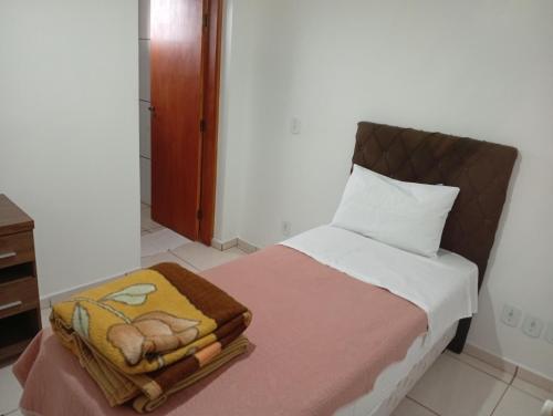 Postel nebo postele na pokoji v ubytování Hotel João Luzia