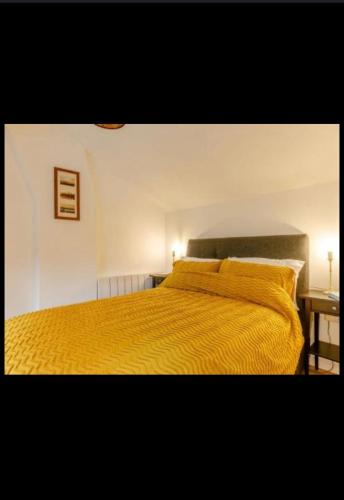 Ένα ή περισσότερα κρεβάτια σε δωμάτιο στο The cobblers