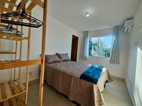 Postel nebo postele na pokoji v ubytování Penthouse 3min da Praia do Peró