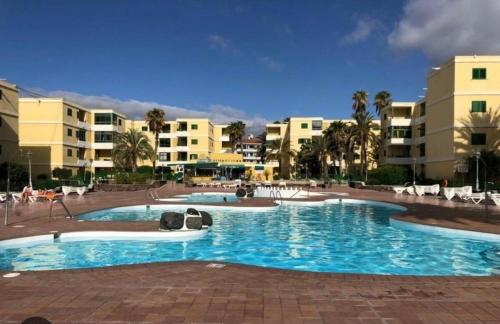 Beach life only 5 minutes away and Heated pool