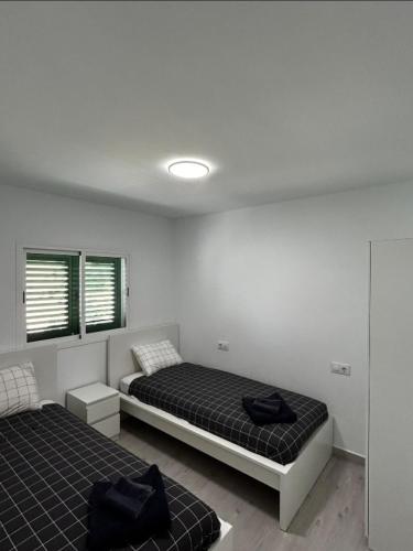 Beach life only 5 minutes away and Heated pool