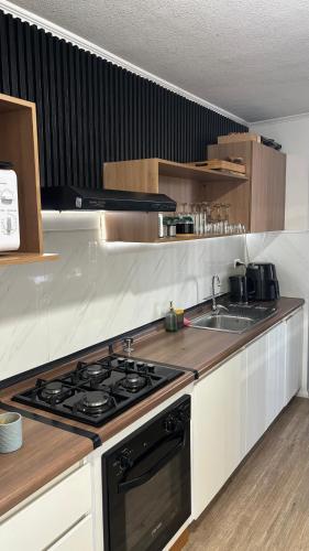 Η κουζίνα ή μικρή κουζίνα στο Apartamento